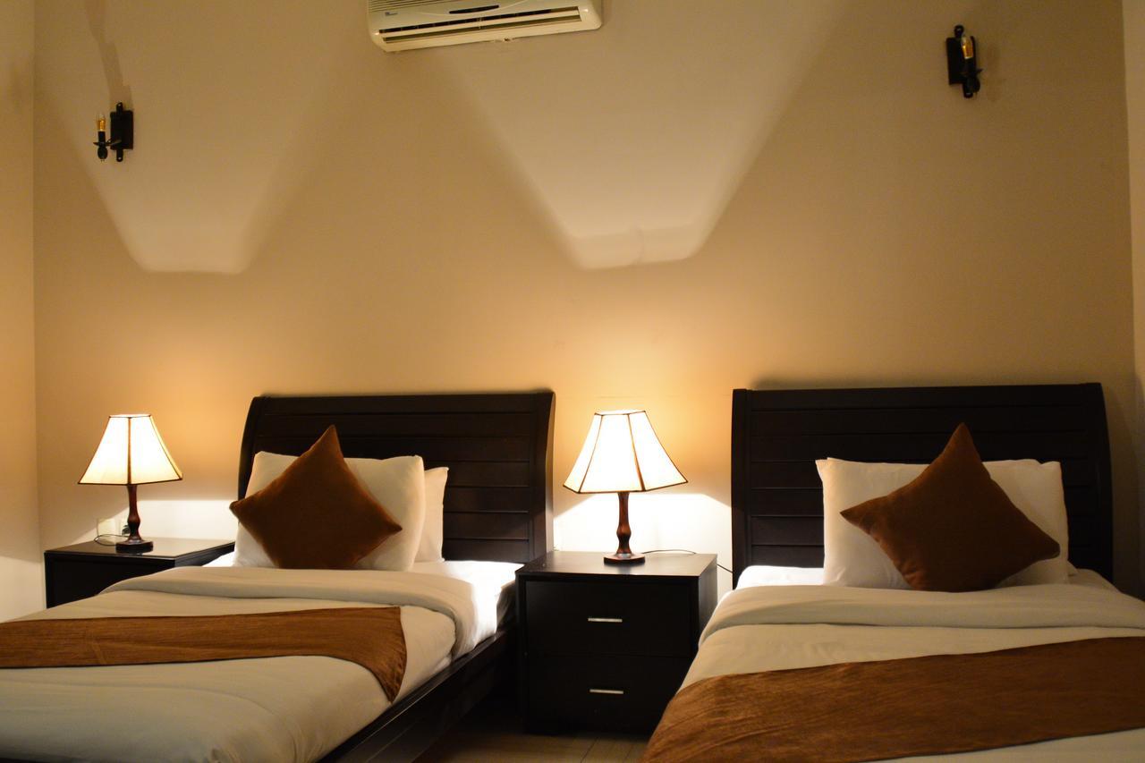 Lilium Hotel Safut Bagian luar foto