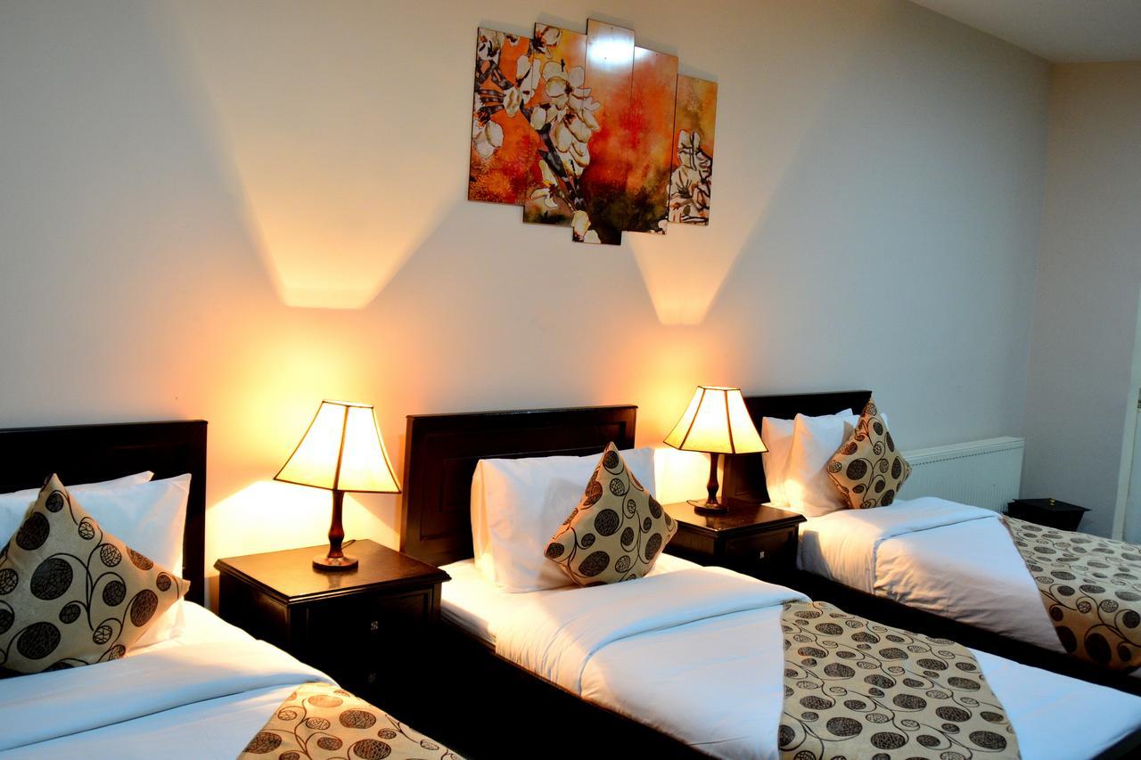 Lilium Hotel Safut Bagian luar foto